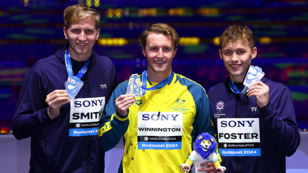 Men's 400m freestyle medallists Kieran Smith (left), Elijah Winnington and Carson Foster on day three of the World Aquatics Swimming Championships (25m) 2024.