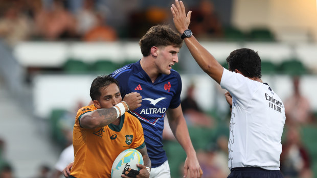 Maurice Longbottom of Australia celebrates a try.