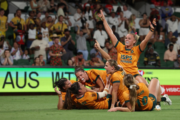 Australia celebrate winning at HBF Park.