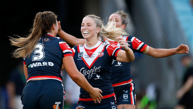 Tarryn Aiken celebrates with Jess Sergis.