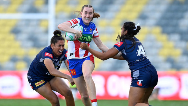 Tamika Upton of the Knights makes a break during the round nine NRLW match between North Queensland Cowboys and Newcastle Knights.