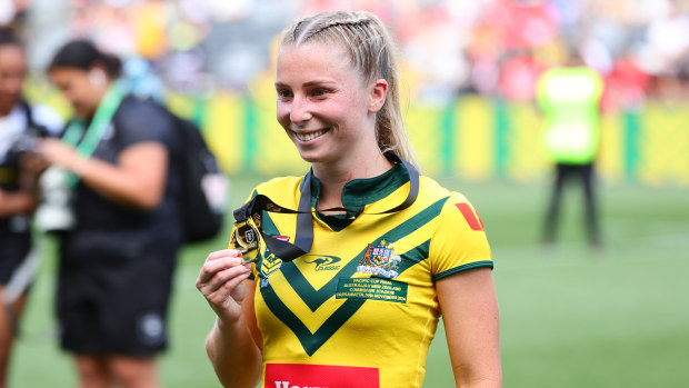 Tarryn Aiken shows off her medal for player of the match during the Pacific Cup women's final against the New Zealand Kiwi Ferns.