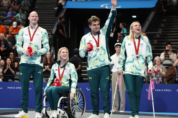 From left: Rowan Crothers, Chloe Osborn, Callum Simpson and Alexa Leary celebrate winning relay silver at the Paris Paralympics.