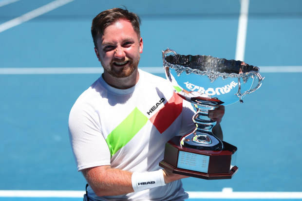 Sam Schroder of the Netherlands poses with the championship trophy.