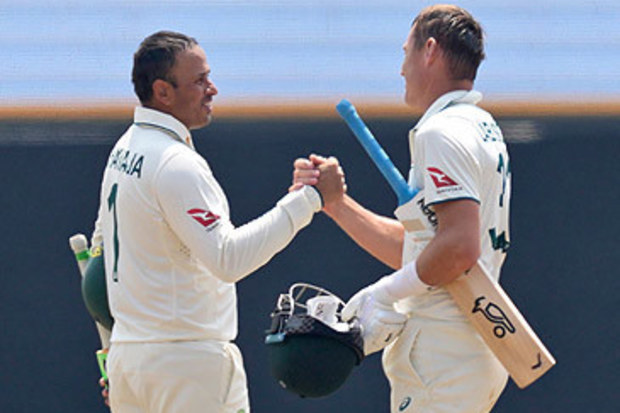 Usman Khawaja and Marnus Labuschagne celebrate winning second Test in Sri Lanka (Eranga Jayawardena/AP)