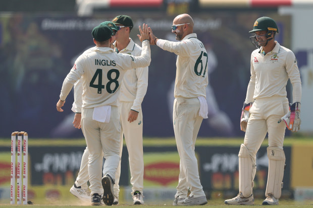 Nathan Lyon of Australia celebrates after taking the wicket of Kusal Mendis.