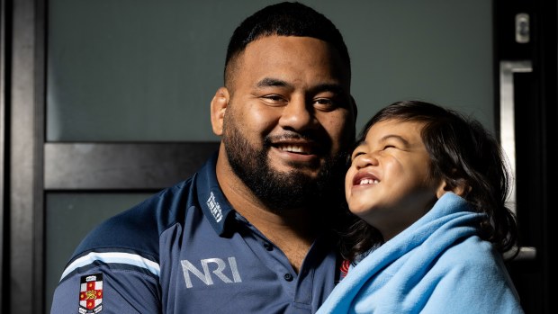 Taniela Tupou and his son.