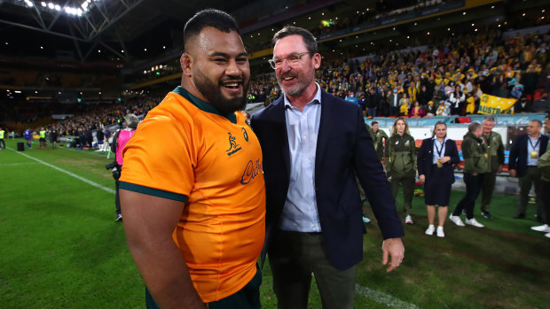 Taniela Tupou and assistant coach Dan McKellar of the Wallabies celebrate in 2021.