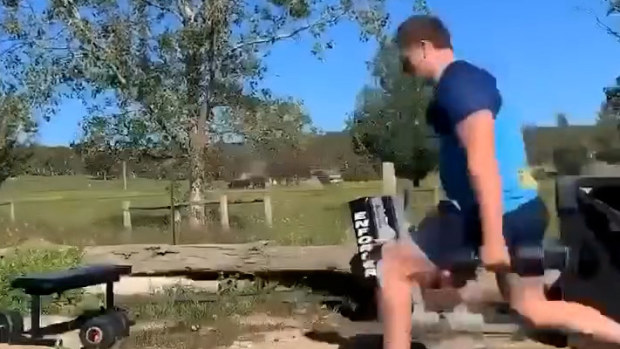 Waratahs and Wallabies prop Angus Bell puts in the hard graft at his family farm in Bungendore.