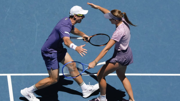 Olivia Gadecki and John Peers celebrate after defeating compatriots Kimberly Birrell and John-Patrick Smith in the mixed doubles final.