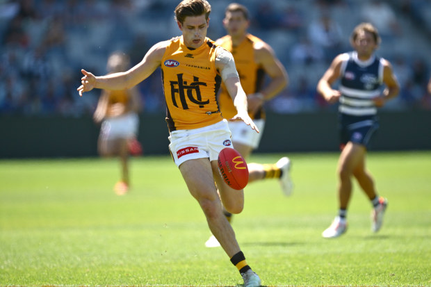 Will Day of the Hawks kicks during a practice match against the Cats.