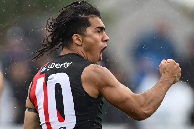 Isaac Kako of the Bombers celebrates a pre-season goal against the Dogs.