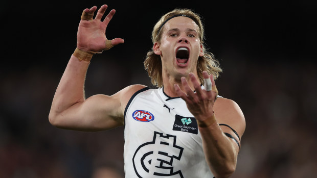 MELBOURNE, AUSTRALIA - SEPTEMBER 15: Tom De Koning of the Blues celebrates scoring a goal during the AFL First Semi Final match between Melbourne Demons and Carlton Blues at the Melbourne Cricket Ground, on September 15, 2023, in Melbourne, Australia. (Photo by Robert Cianflone/Getty Images)