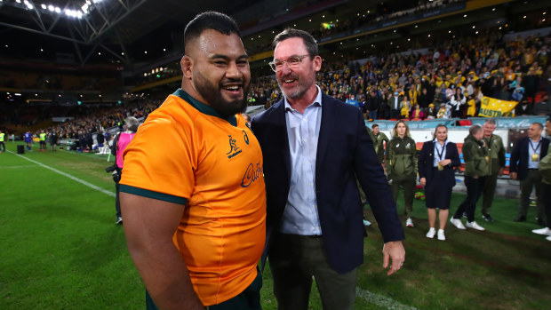 Taniela Tupou and assistant coach Dan McKellar of the Wallabies celebrate in 2021.