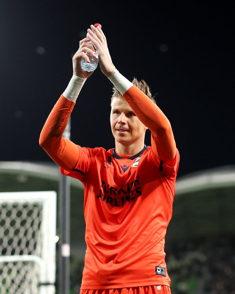 Mitch Langerak celebrating