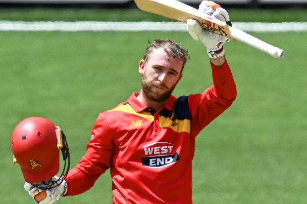 Mackenzie Harvey acknowledges the crowd at Adelaide Oval.