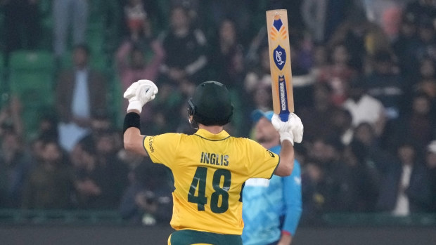 Josh Inglis of Australia celebrates after hitting the winning runs during the ICC Champions Trophy match against England, in Lahore, Pakistan, on February 22, 2025. (AP Photo/K.M. Chaudary)
