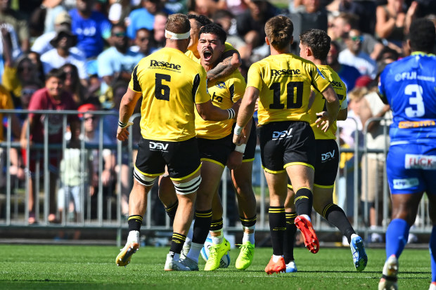 Du'Plessis Kirifi of the Hurricanes reacts after scoring a try.