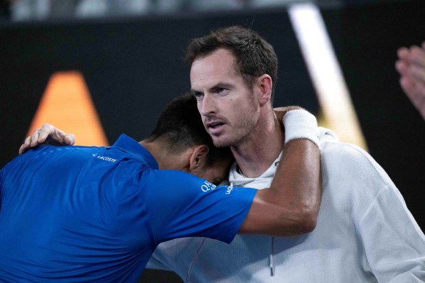 Novak Djokovic embraces Andy Murray.