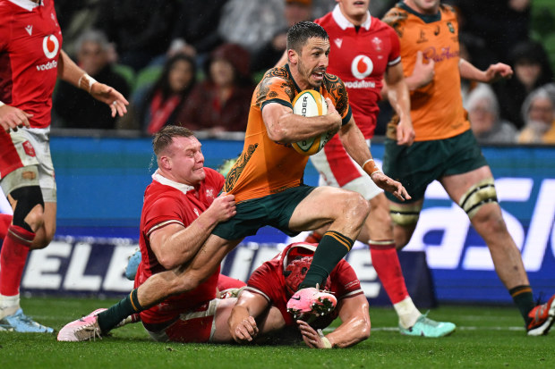 Jake Gordon of the Wallabies scores a try.