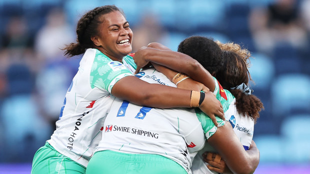 Drua players celebrating after a win.