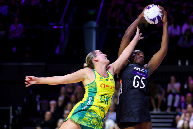 Grace Nweke of New Zealand and Courtney Bruce of Australia contest the ball.