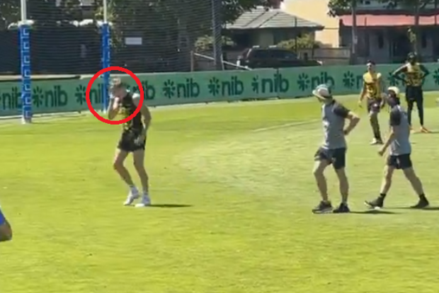Tom Lynch stumbled off the Punt Road training track after a heavy knock.