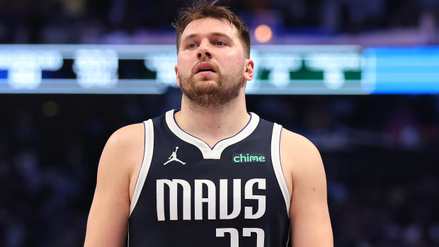 Luka Doncic of the Dallas Mavericks walks across the court in the second quarter.