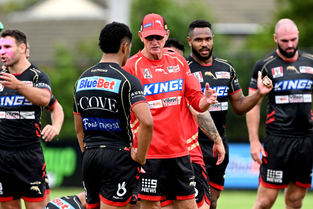 Former Dolphins coach Wayne Bennett talks tactics with Isaiya Katoa.
