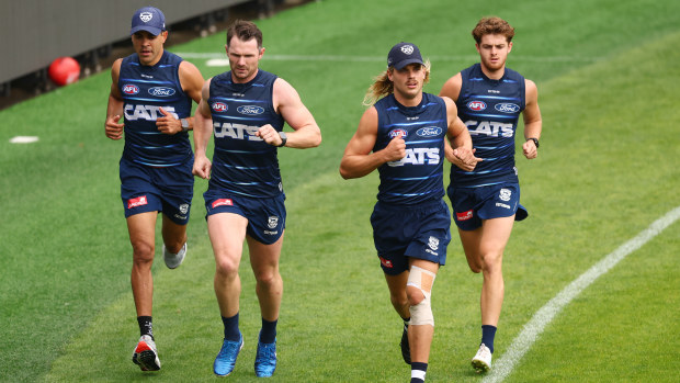 Jack Martin, Patrick Dangerfield, Bailey Smith, Oliver Wiltshire of the Cats train at Kardinia Park.