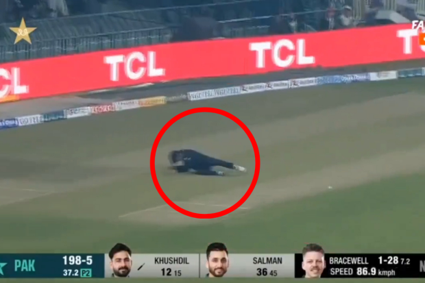 Rachin Ravindra is struck in the face by the ball.