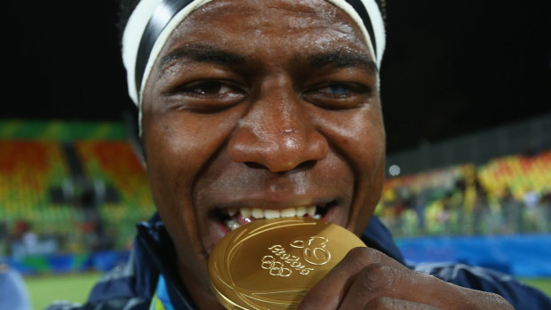 Masivesi Dakuwaqa with his gold medal at the Rio 2016 Olympics.