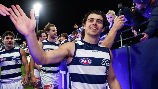 Oisin Mullin of the Cats leaves the field after a win in 2024.