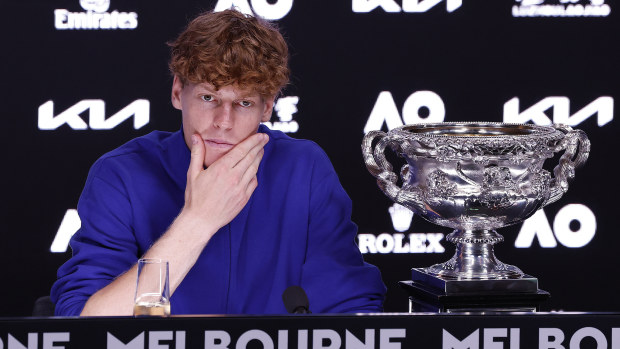 Men's singles champion Jannik Sinner attends a press conference.