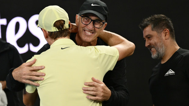 Jannik Sinner and Darren Cahill embrace after the Italian's 2025 Australian Open final triumph.