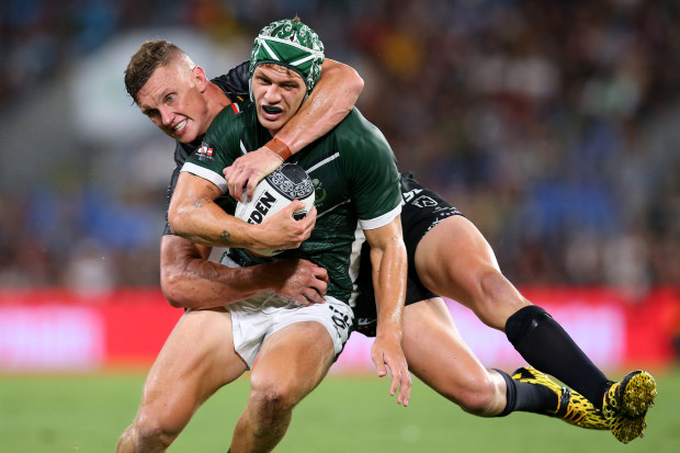 Kalyn Ponga of the Maori All Stars is tackled by Jack Wighton of the Indigenous All Stars in 2020.