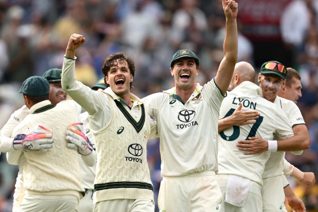 Sam Konstas and Pat Cummins celebrate at the MCG.