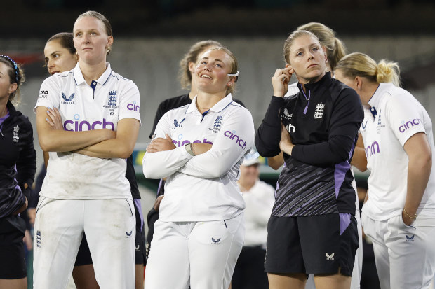 Heather Knight and England teammates look on after their Ashes lost.