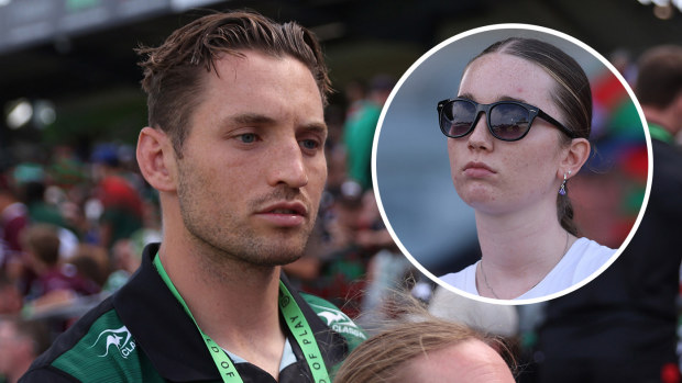 Cameron Murray signs autographs as frustrated fans wait in the stands during a lengthy delay ahead of the NRL trial between the Rabbitohs and Manly on the Central Coast.