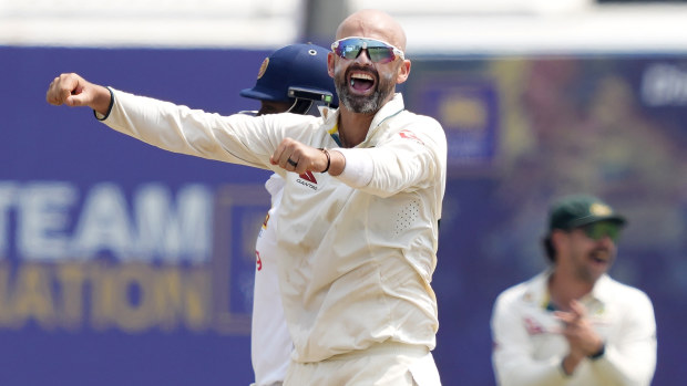 Australia's Nathan Lyon celebrates the wicket of Sri Lanka's Dinesh Chandimal during day three of the second test cricket match between Sri Lanka and Australia in Galle, Sri Lanka, Saturday, Feb. 8, 2025. (AP Photo/Eranga Jayawardena)