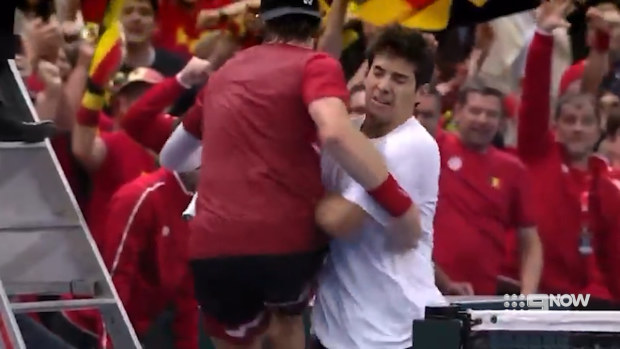 Zizou Bergs collides with Cristian Garin during the Davis Cup.