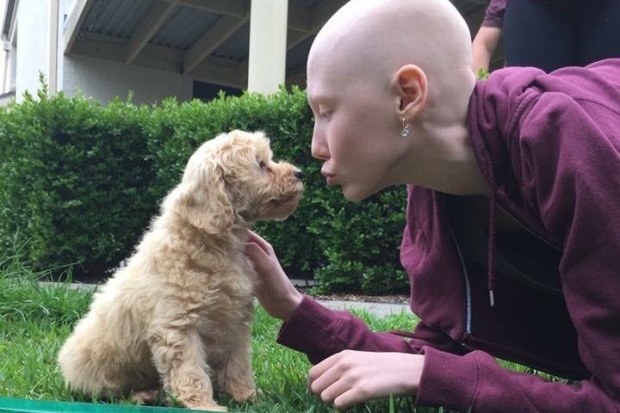 Chloe Osborn with her puppy.
