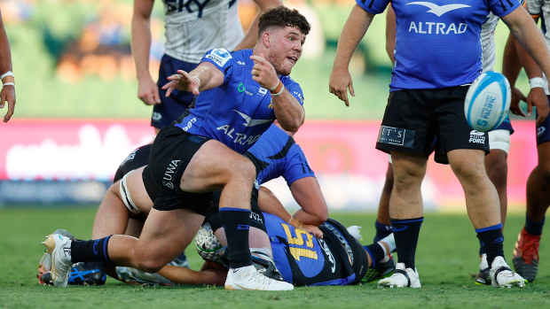 Carlo Tizzano of the Force passes the ball.