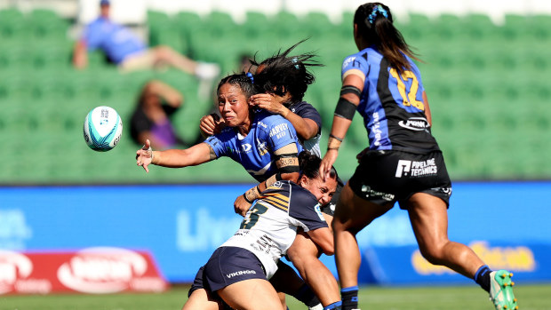 Cecilia Smith of the Force passes the ball.