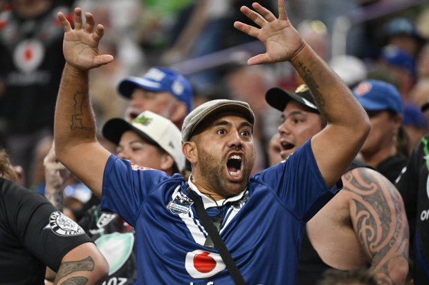 A Warriors fan reacts after seeing the food and drink price list at Allegiant Stadium.