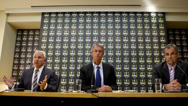 From left: News Limited chairman and CEO John Hartigan, NRL chief executive David Gallop and Melbourne Storm chairman Rob Moodie at the press conference where the club's salary-cap penalties were announced.