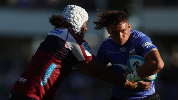 Reesjan Pasitoa of the Force runs with the ball.