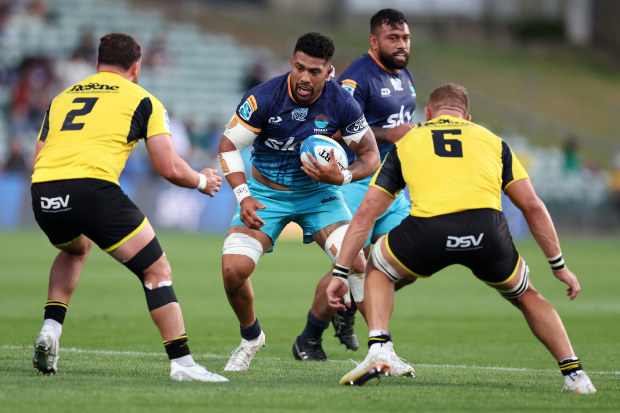 Ardie Savea, captain of Moana Pasifika, looks for a gap.
