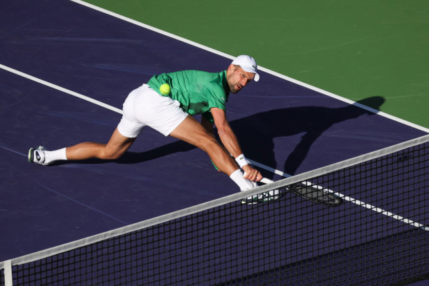 Novak Djokovic executes a backhand stroke during the BNP Paribas Open on March 8, 2025, at Indian Wells.