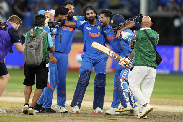 India's players celebrate after winning the ICC Champions Trophy.